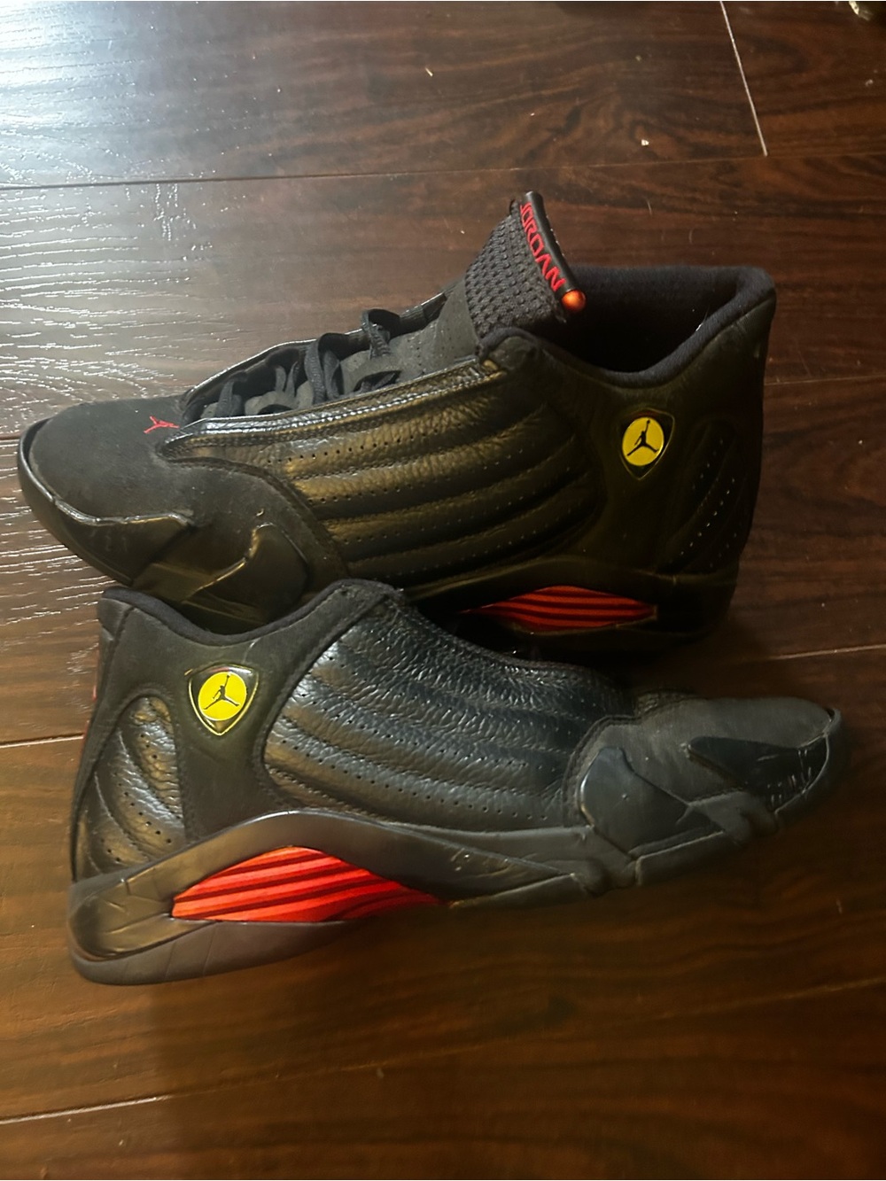 Jordan Black Athletic Shoes with Red and Yellow Details